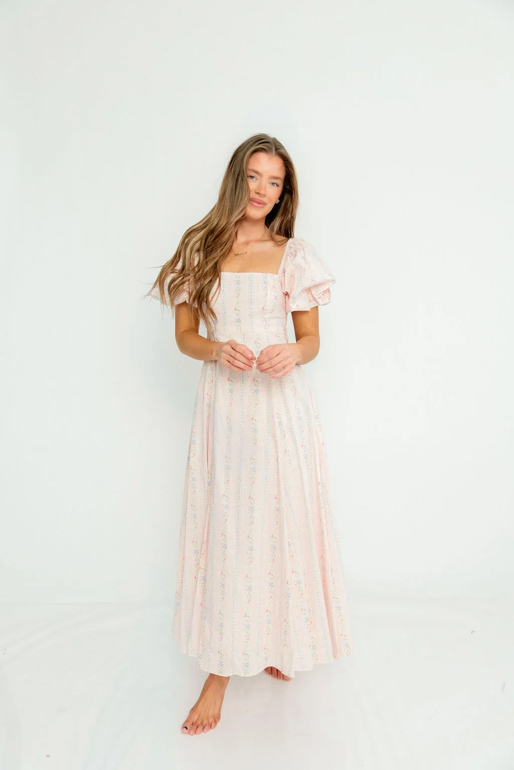 Tate Floral Print Puff Sleeve Midi Dress in Pink sold by Worth Collective product image thumbnail 2