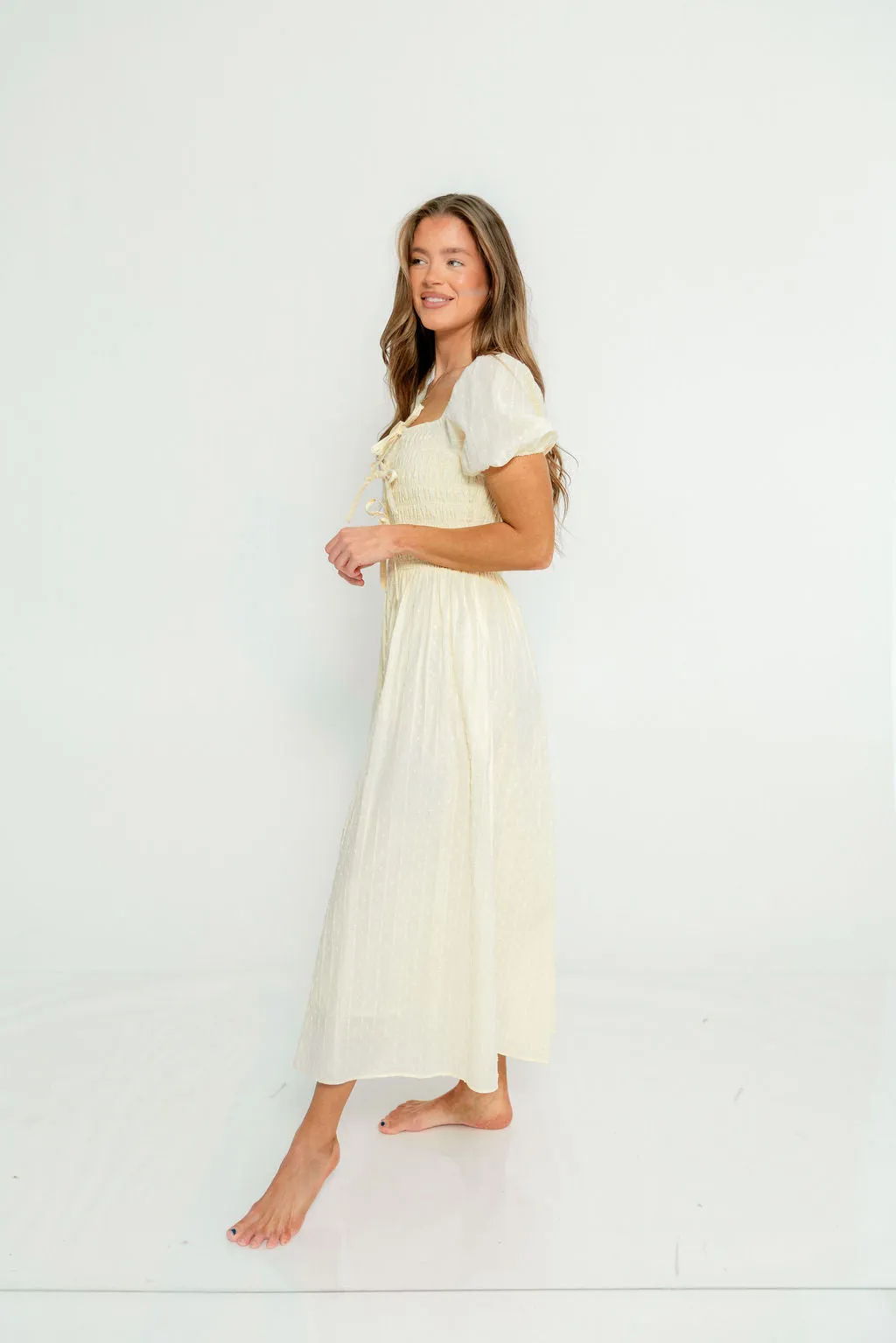 Arabelle Smocked Bow Detail Maxi Dress in Lemon Water sold by Worth Collective product image thumbnail 5