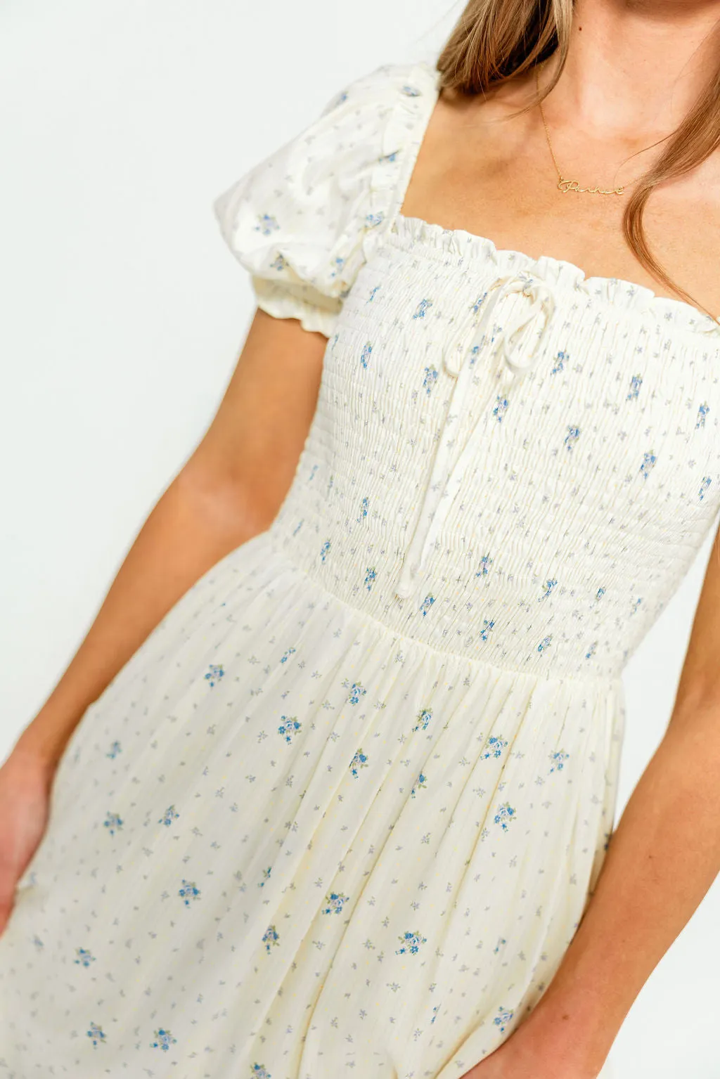 Nya 100% Cotton Smocked Midi Dress in Cream Blue Floral sold by Worth Collective product image thumbnail 5