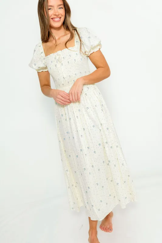 Nya 100% Cotton Smocked Midi Dress in Cream Blue Floral sold by Worth Collective