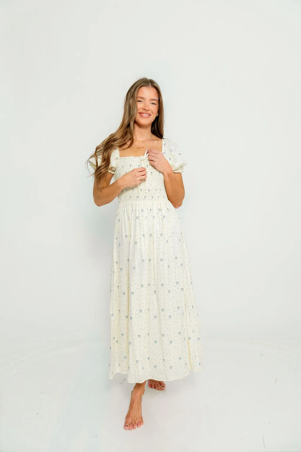 Nya 100% Cotton Smocked Midi Dress in Cream Blue Floral sold by Worth Collective product image thumbnail 2
