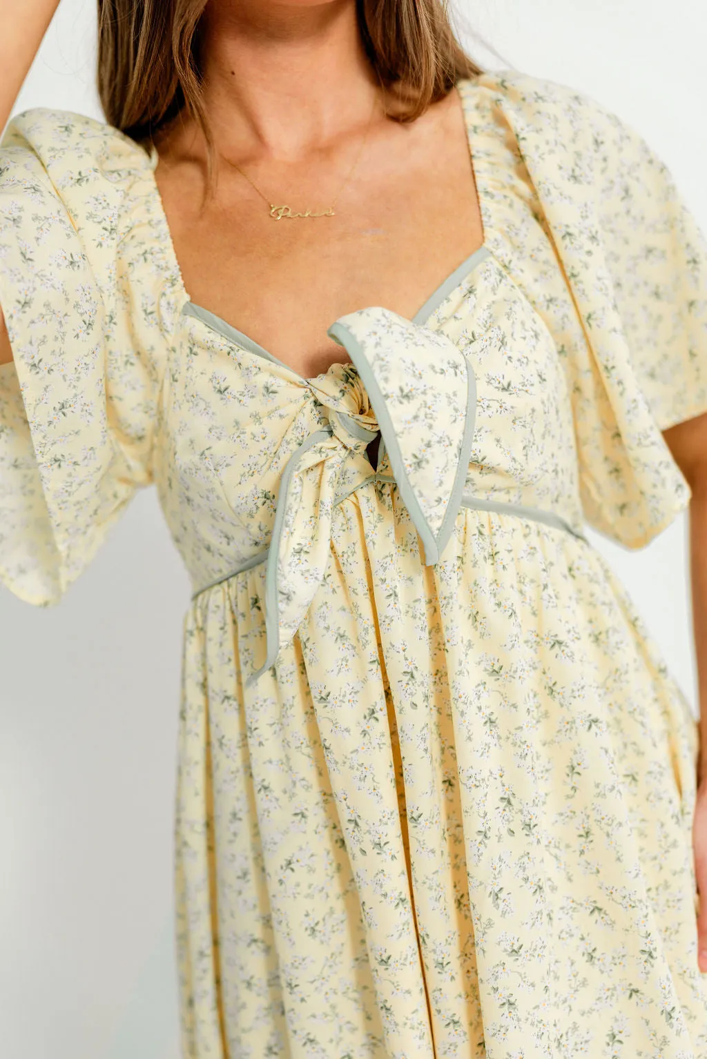 Alexis Floral Midi Dress in Butter Cream - Bump Friendly sold by Worth Collective product image thumbnail 3