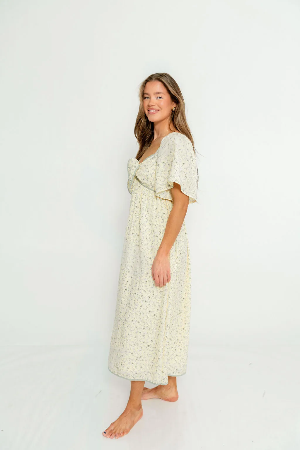Alexis Floral Midi Dress in Butter Cream - Bump Friendly sold by Worth Collective product image thumbnail 4