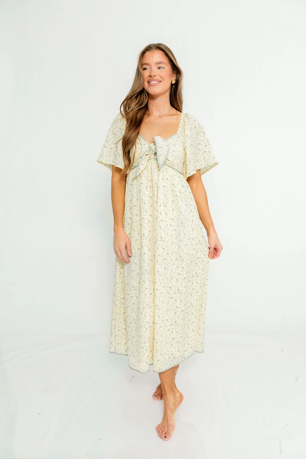 Alexis Floral Midi Dress in Butter Cream - Bump Friendly sold by Worth Collective