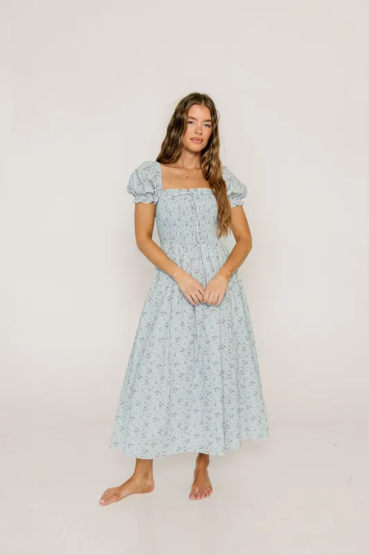 Nya 100% Cotton Smocked Midi Dress in Blue Multi Floral sold by Worth Collective