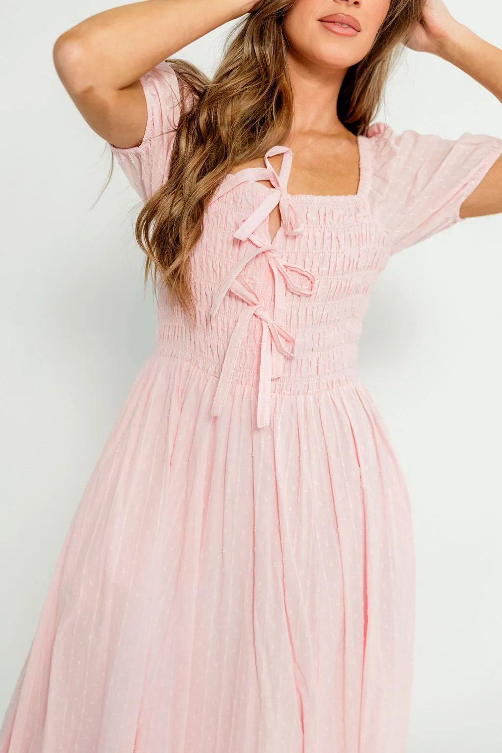 Arabelle 100% Cotton Smocked Bow Detail Maxi Dress in Pink Peony sold by Worth Collective product image thumbnail 3