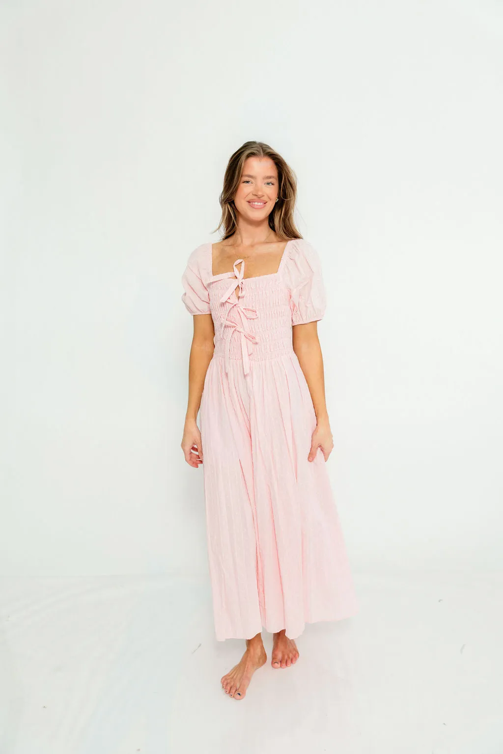 Arabelle 100% Cotton Smocked Bow Detail Maxi Dress in Pink Peony sold by Worth Collective product image thumbnail 4