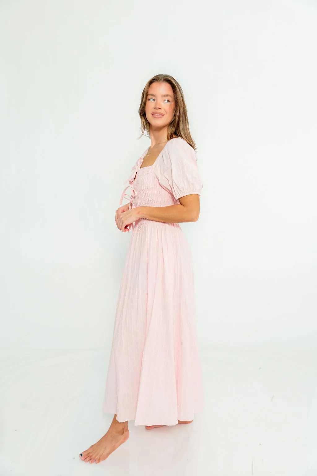 Arabelle 100% Cotton Smocked Bow Detail Maxi Dress in Pink Peony sold by Worth Collective product image thumbnail 5