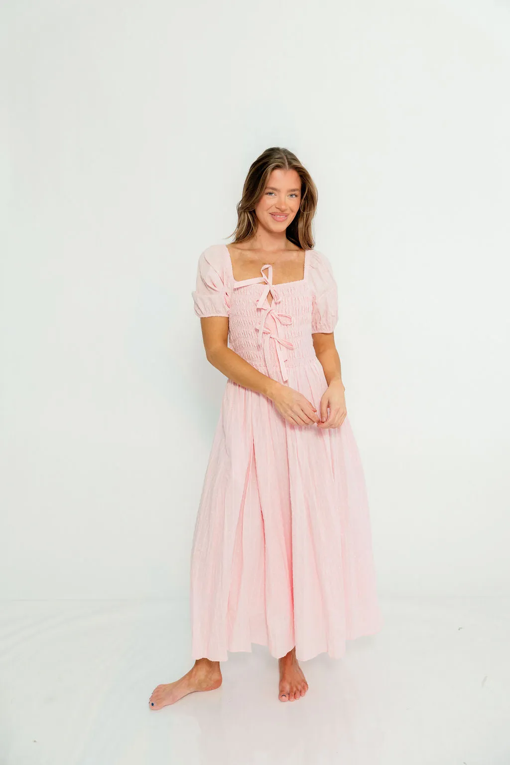 Arabelle 100% Cotton Smocked Bow Detail Maxi Dress in Pink Peony sold by Worth Collective product image thumbnail 2
