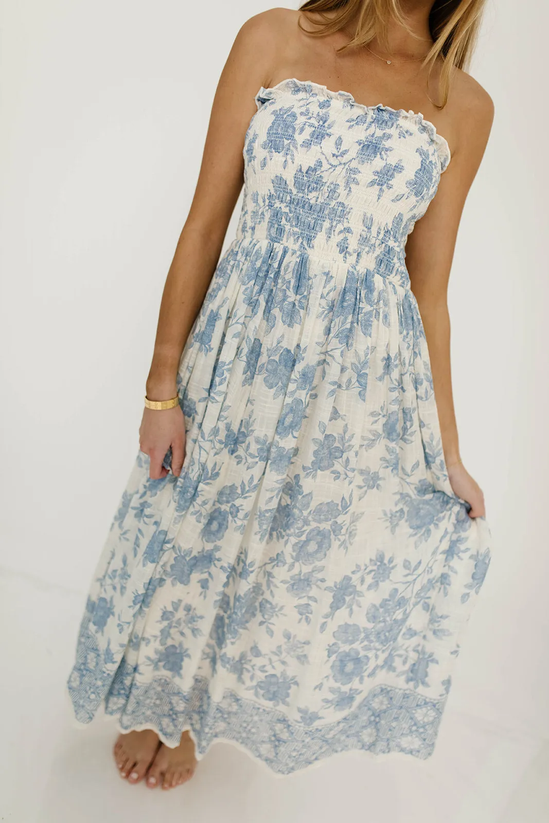 Solena Floral Smocked Midi Dress in Ivory/Blue sold by Worth Collective product image thumbnail 4