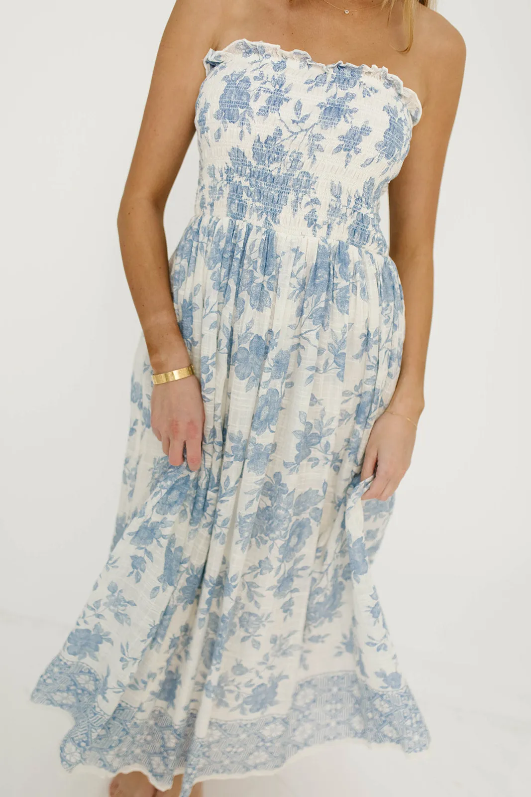 Solena Floral Smocked Midi Dress in Ivory/Blue sold by Worth Collective product image thumbnail 5