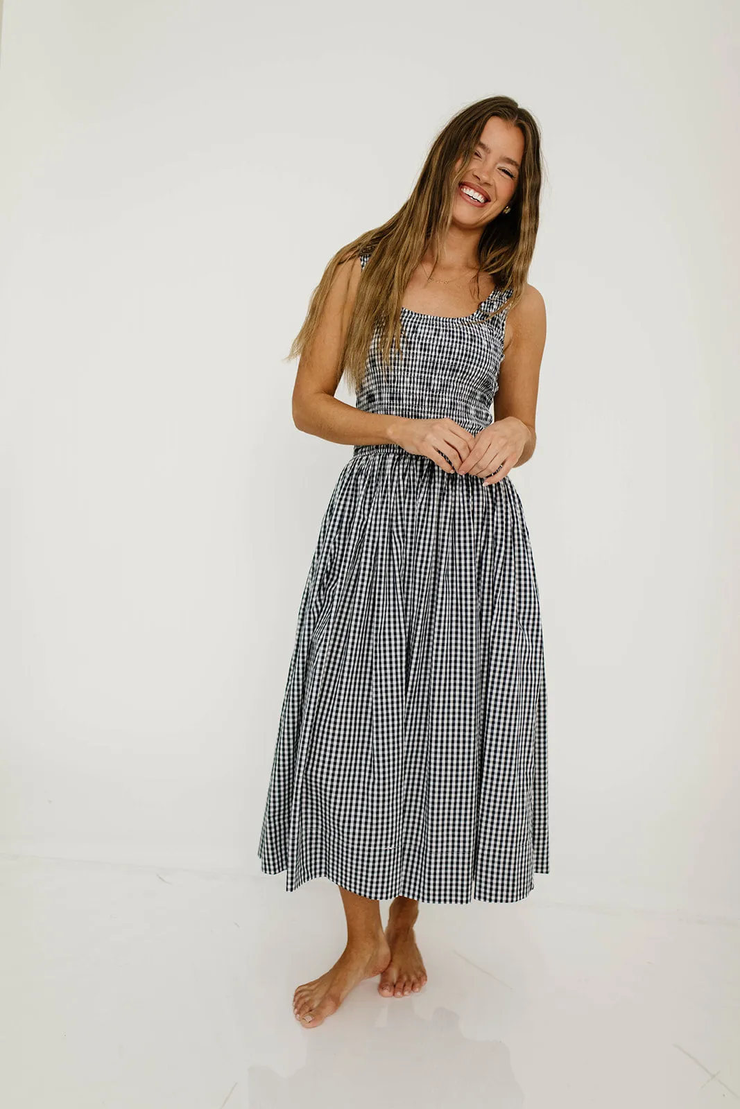 Janice 100% Cotton Gingham Smocked Midi Dress in Navy sold by Worth Collective product image thumbnail 4