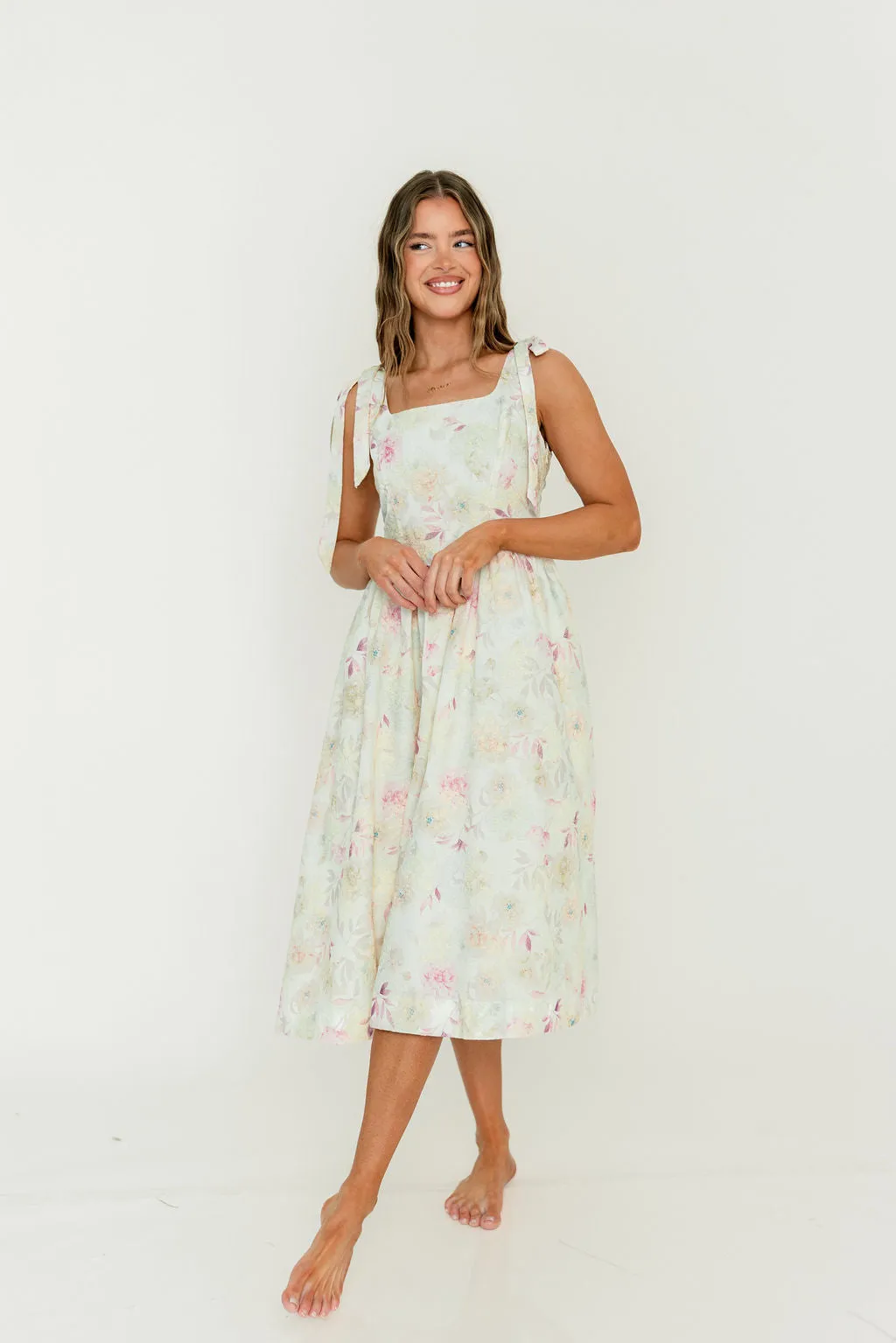 Jenny Floral Midi Dress in Light Pink sold by Worth Collective