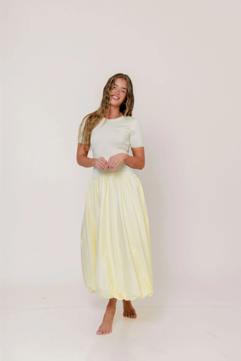 Zaniyah Bubble Skirt Midi Dress in Butter Yellow sold by Worth Collective product image thumbnail 4