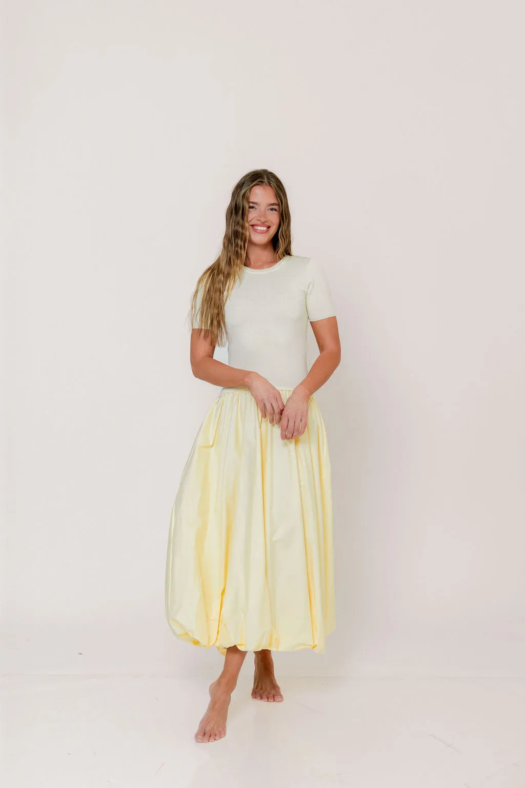 Zaniyah Bubble Skirt Midi Dress in Butter Yellow sold by Worth Collective product image thumbnail 3