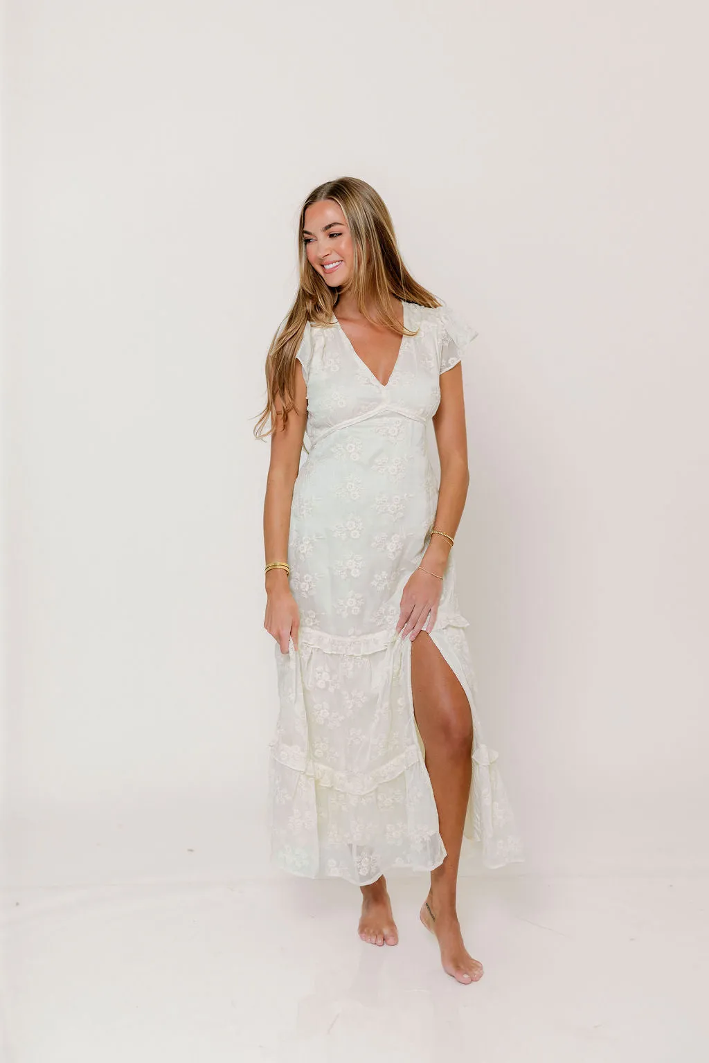 Eleanora Lace Embroidered Tiered Maxi Dress in Buttercream sold by Worth Collective