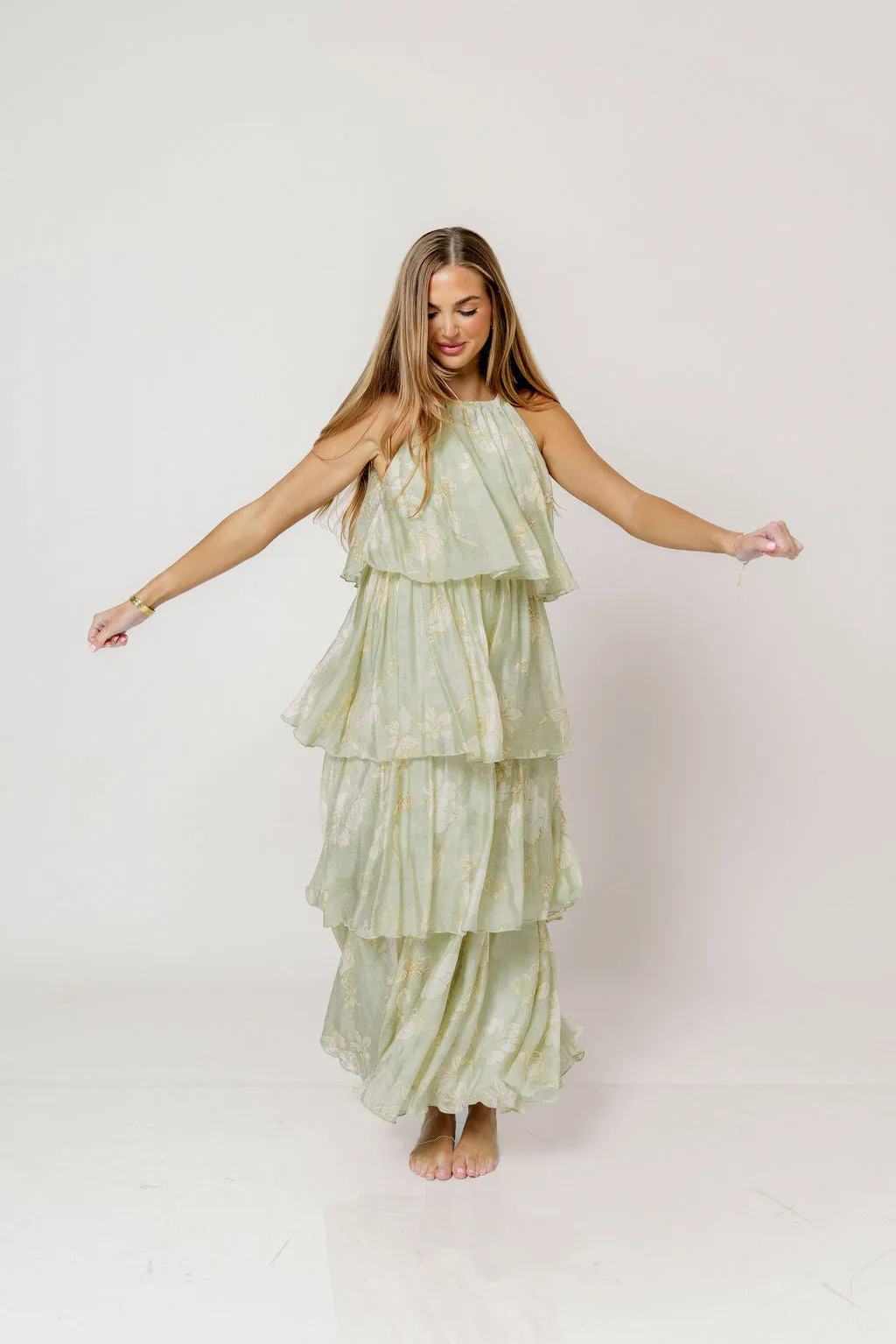Cathy Floral Print Self Tie Halter Ruffle Tiered Maxi Dress in Sage sold by Worth Collective product image thumbnail 4