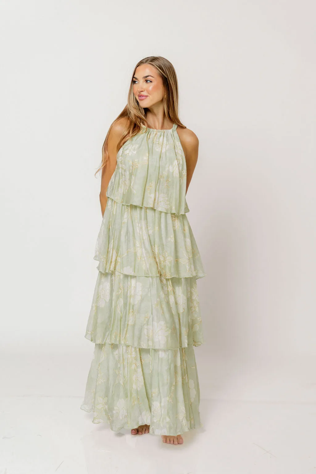 Cathy Floral Print Self Tie Halter Ruffle Tiered Maxi Dress in Sage sold by Worth Collective