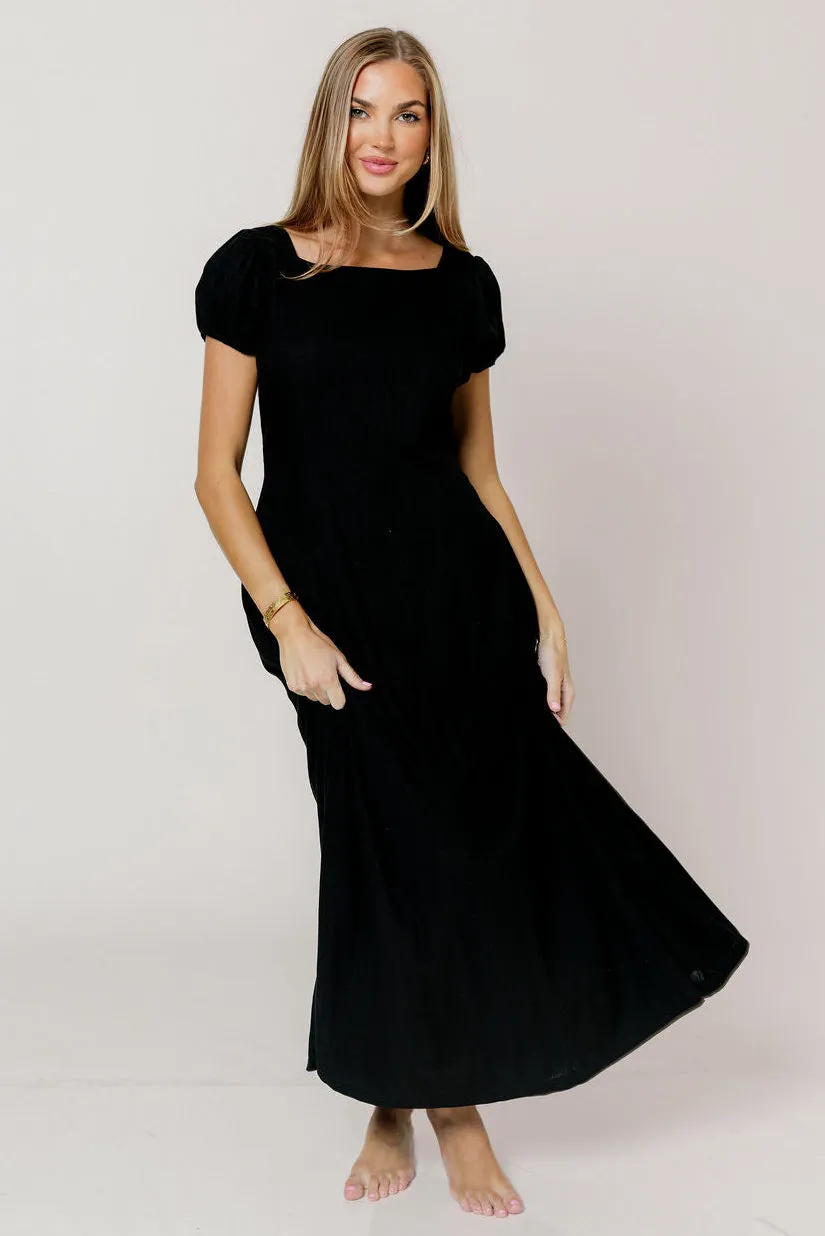 Kameron Midi Dress in Black sold by Worth Collective