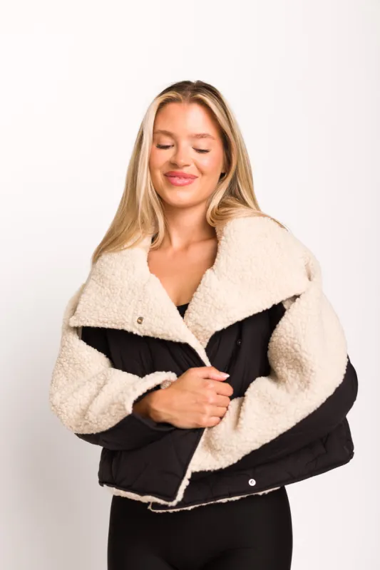 Jacey Quilted Jacket with Fluffy Shearling in Black sold by Worth Collective
