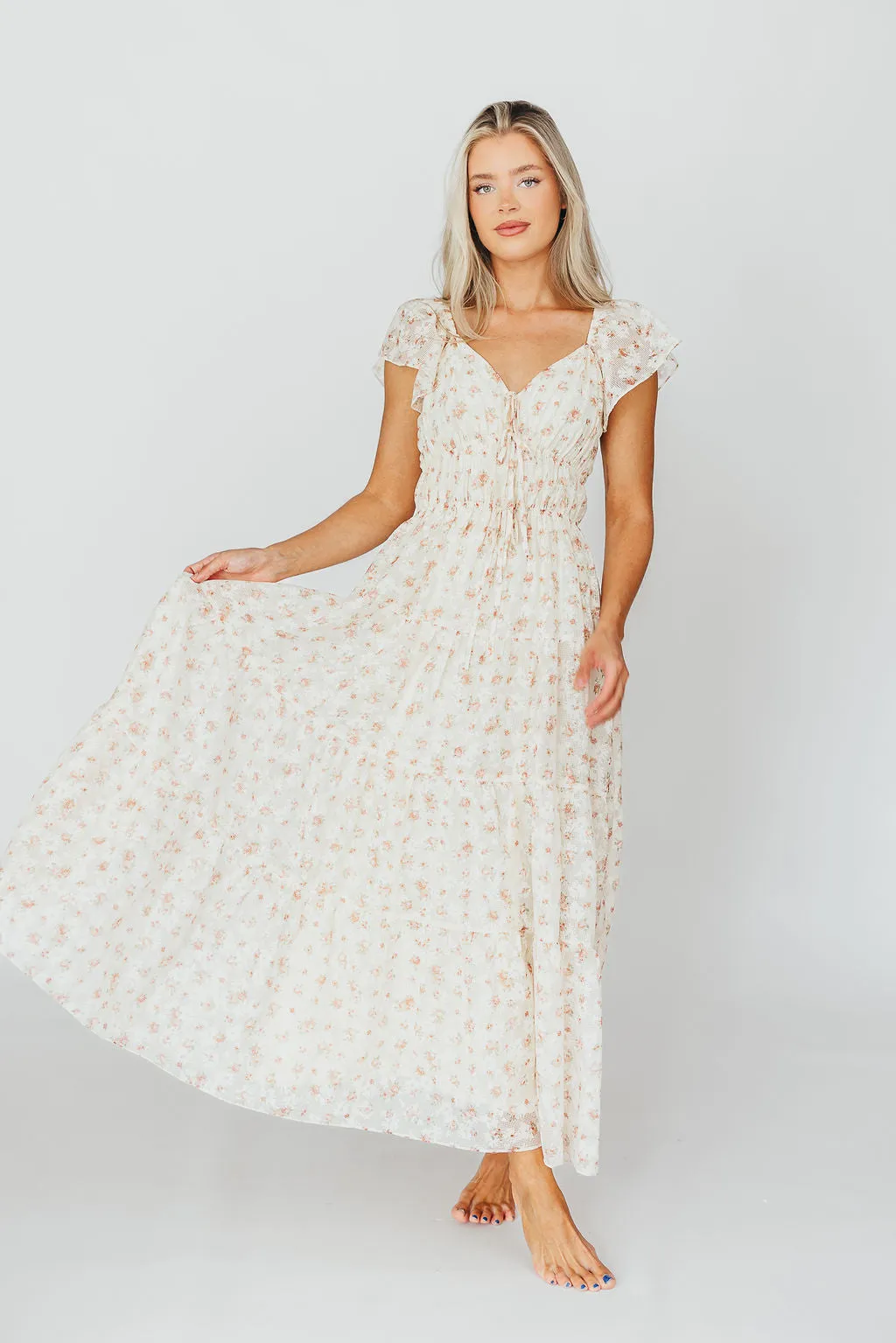 Charming Floral & Gingham Ruffled Maxi Dress in Cream/Peach Floral sold by Worth Collective product image thumbnail 3