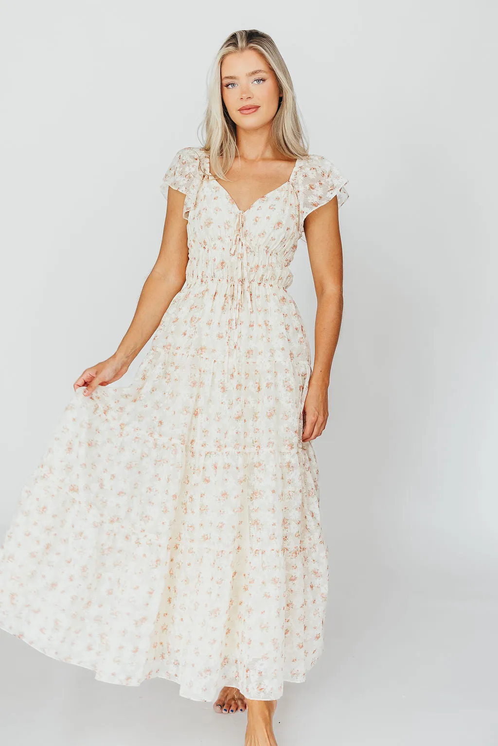 Charming Floral & Gingham Ruffled Maxi Dress in Cream/Peach Floral sold by Worth Collective product image thumbnail 2