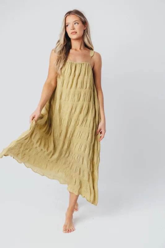 Daniela Textured Midi Dress in Lime sold by Worth Collective
