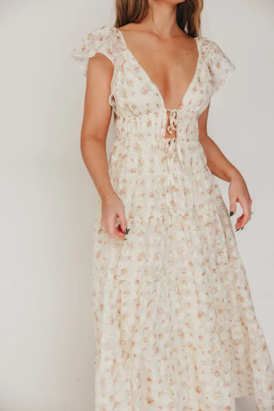 Enchanted Floral & Gingham Ruffled Maxi Dress in Cream/Peach sold by Worth Collective