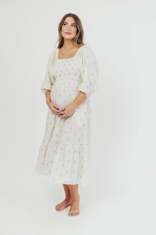 Taylor Cotton Smocked Midi Dress with Tiered Skirt in Soy/Sage Foliage sold by Worth Collective