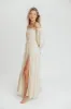 Harper Cru Long Sleeve Off-Shoulder Maxi Dress in Cream (S-XL) sold by Worth Collective