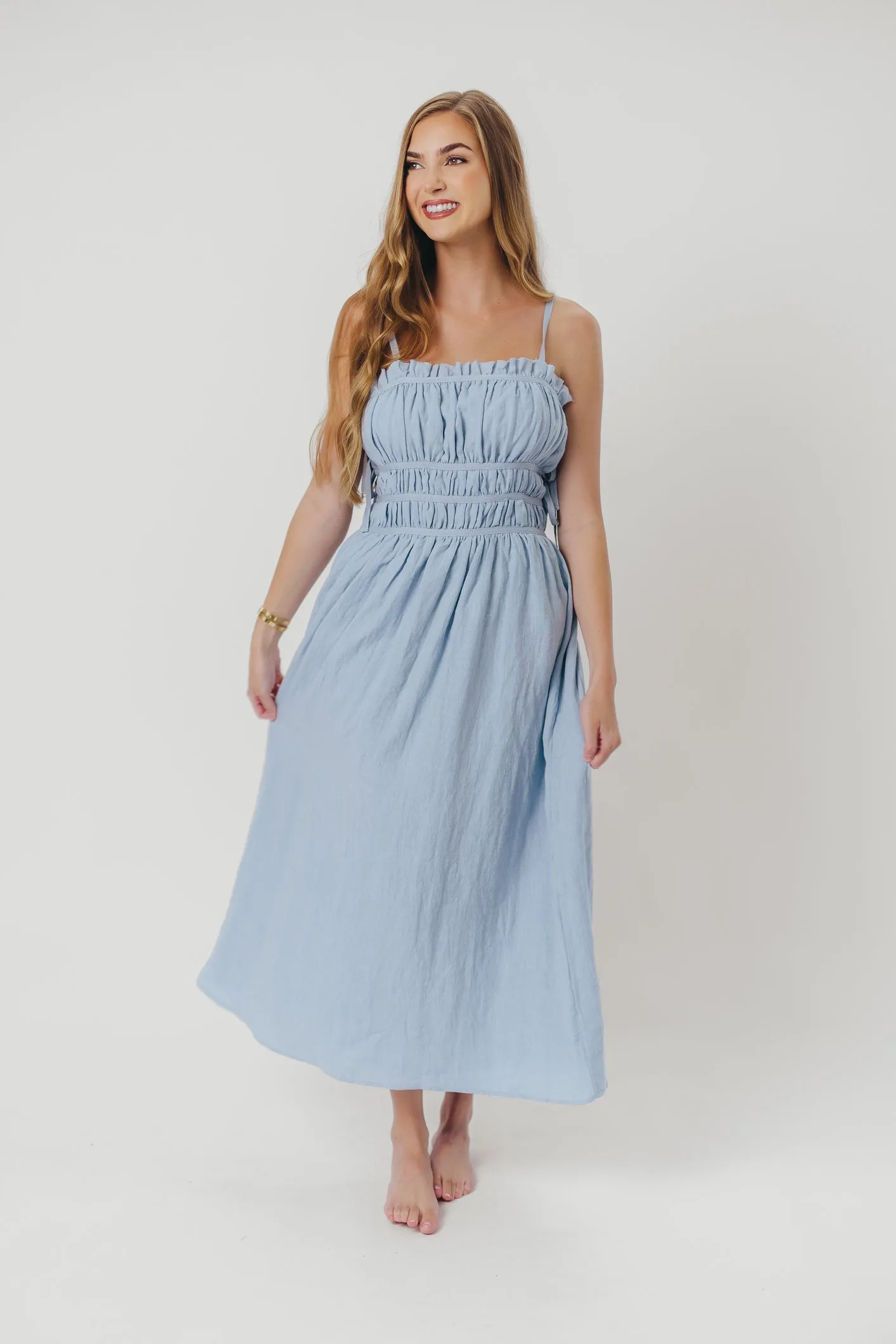Isla Linen Midi Dress with Ruched Bodice and Side Tie in Light Blue sold by Worth Collective