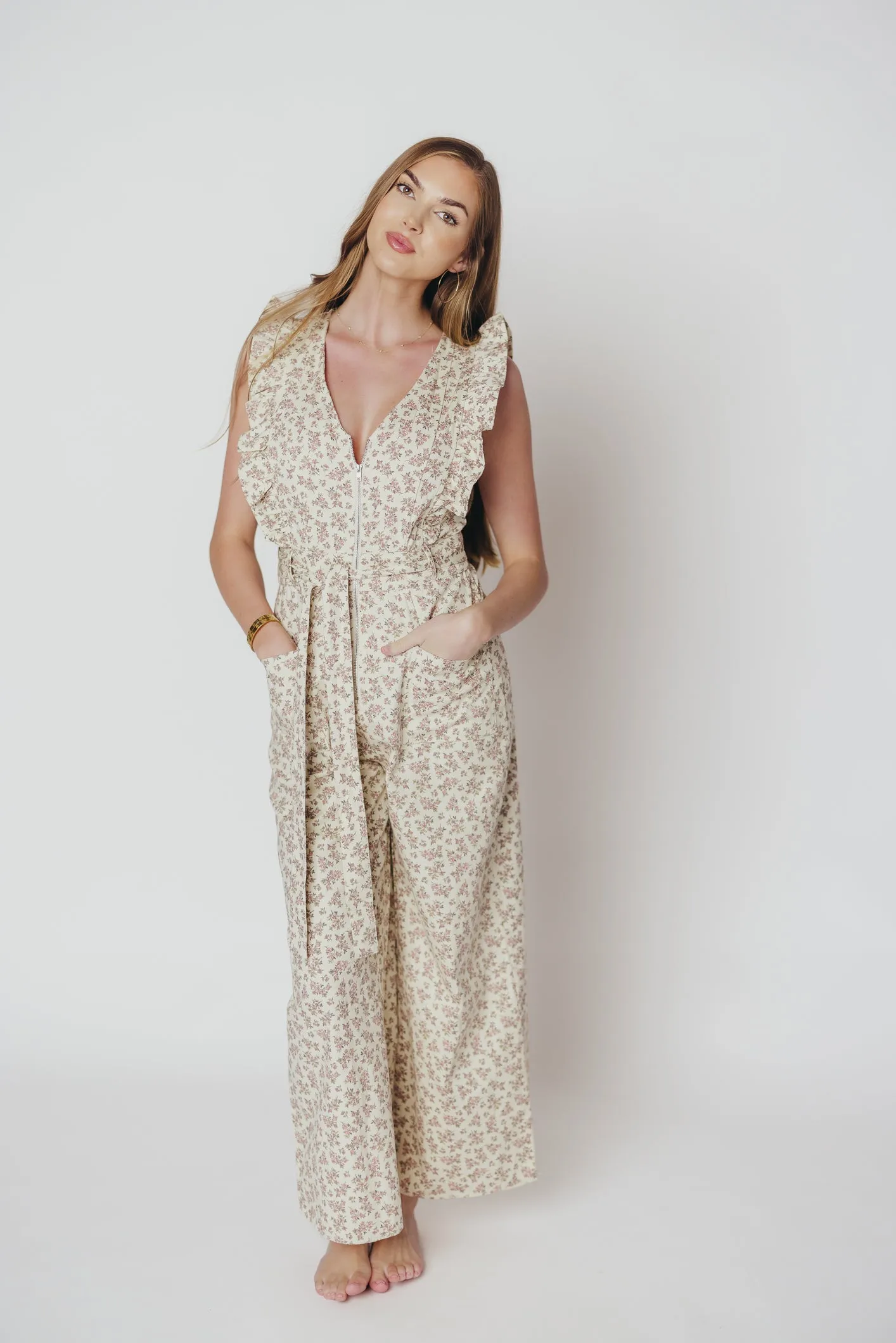 Janet Zippered Jumpsuit with Ruffles in Cream/Pink Floral - Nursing Friendly sold by Worth Collective
