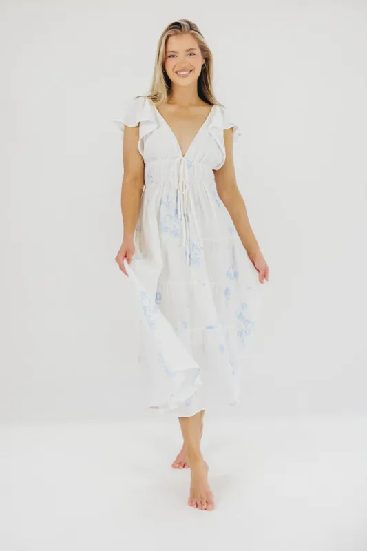 Blaire Ruffled Sleeve Midi Dress in Off-White Floral sold by Worth Collective