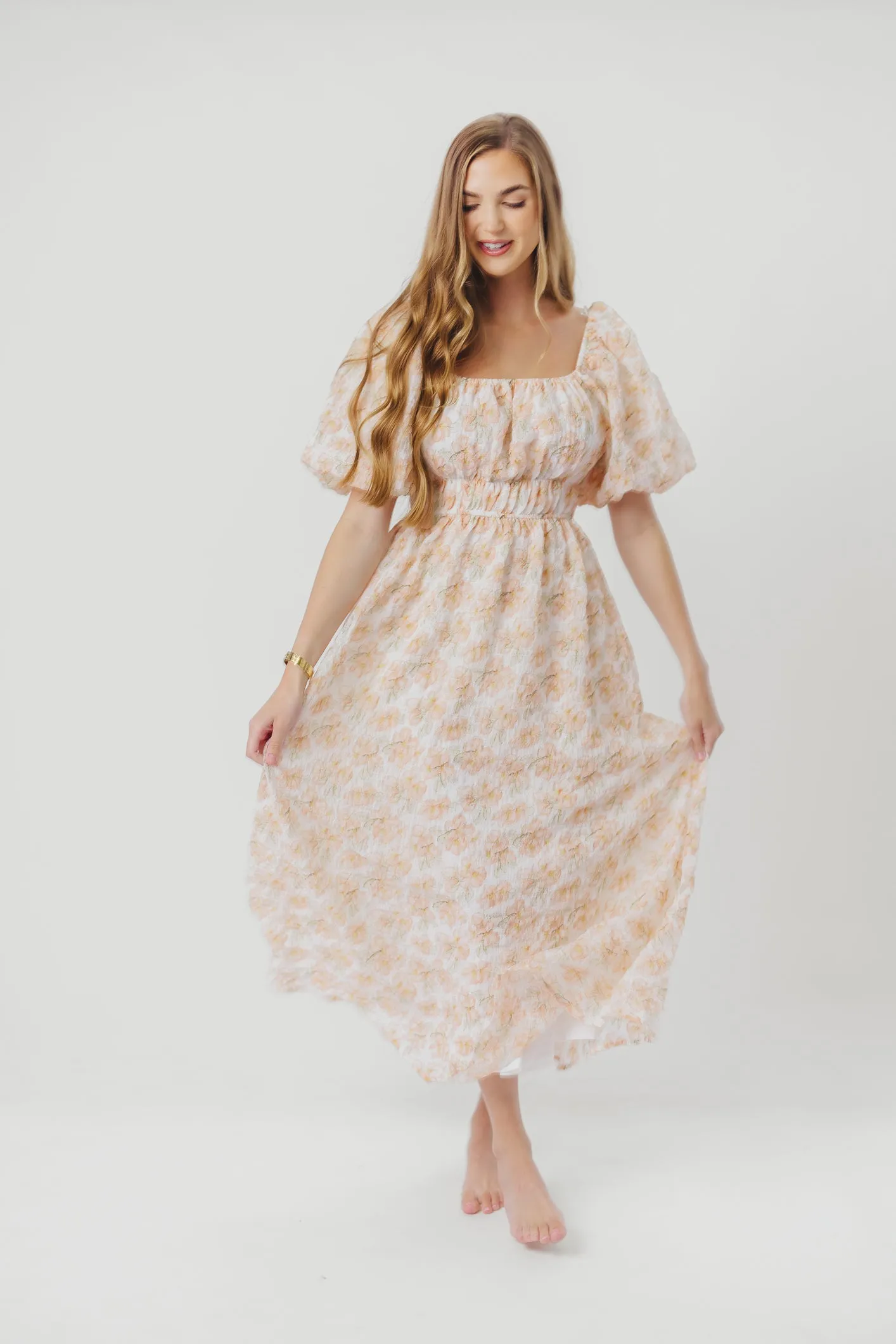 Mallory Textured Print Midi Dress in Tangerine Floral sold by Worth Collective product image thumbnail 3