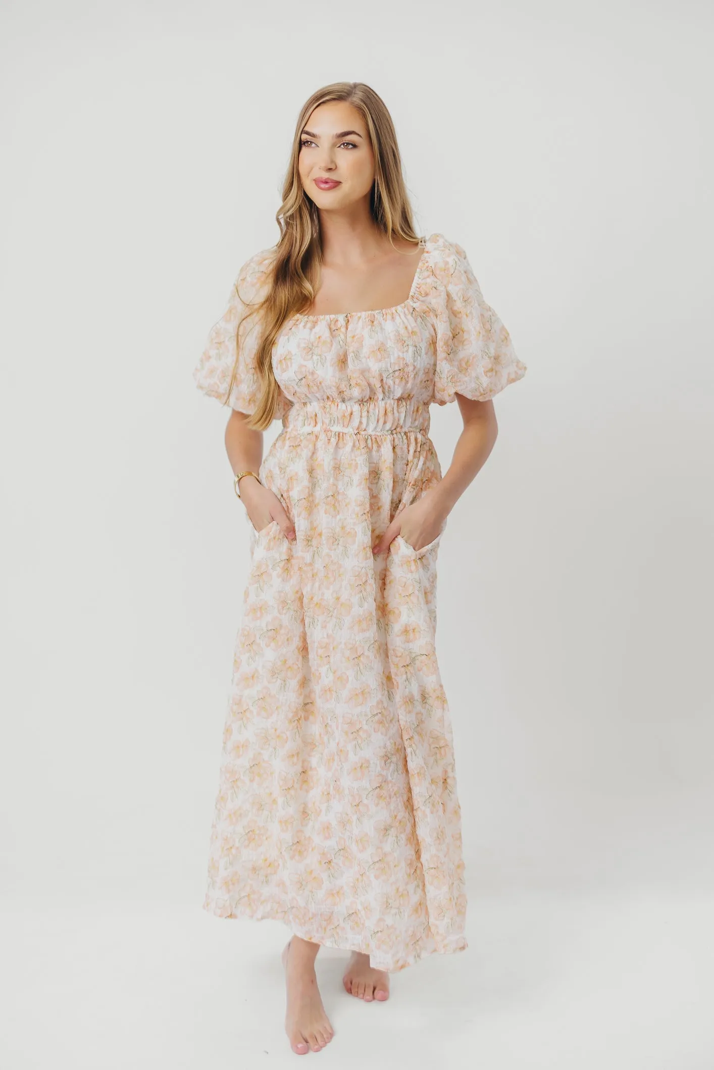 Mallory Textured Print Midi Dress in Tangerine Floral sold by Worth Collective product image thumbnail 4