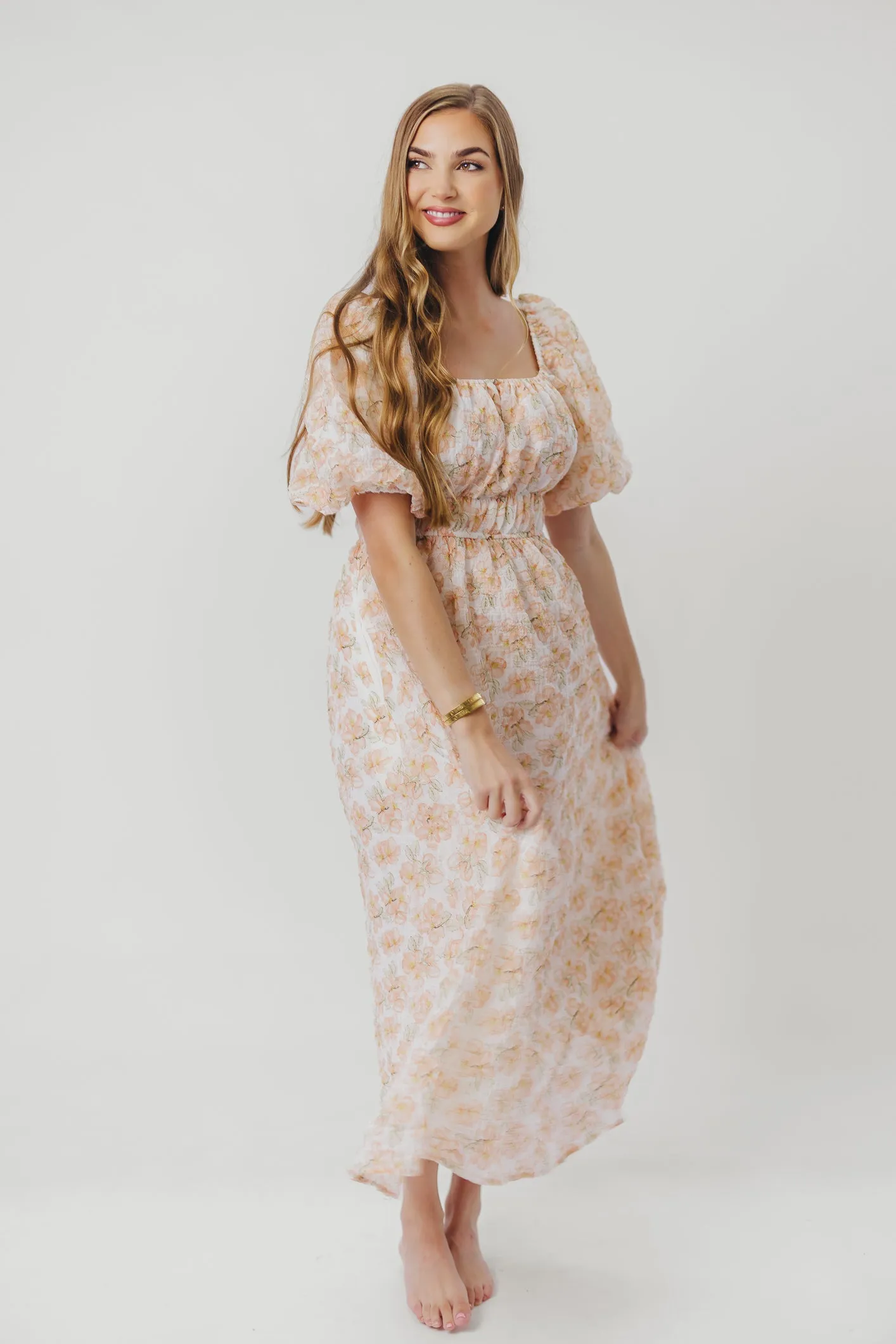 Mallory Textured Print Midi Dress in Tangerine Floral sold by Worth Collective product image thumbnail 2