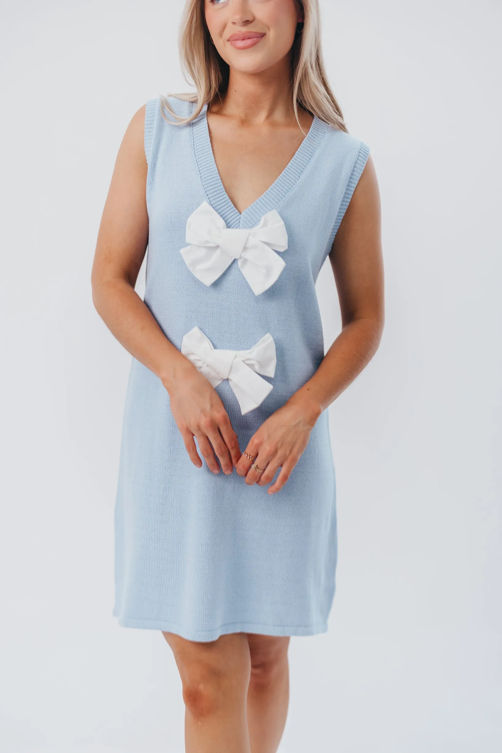 Wendy Sleeveless Sweater Mini Dress with Front Bow Detail in Sky/White sold by Worth Collective product image thumbnail 5