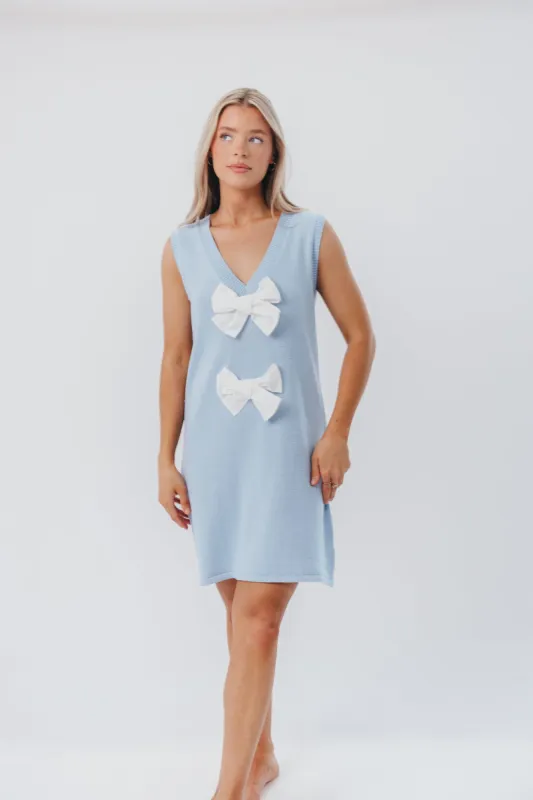 Wendy Sleeveless Sweater Mini Dress with Front Bow Detail in Sky/White sold by Worth Collective