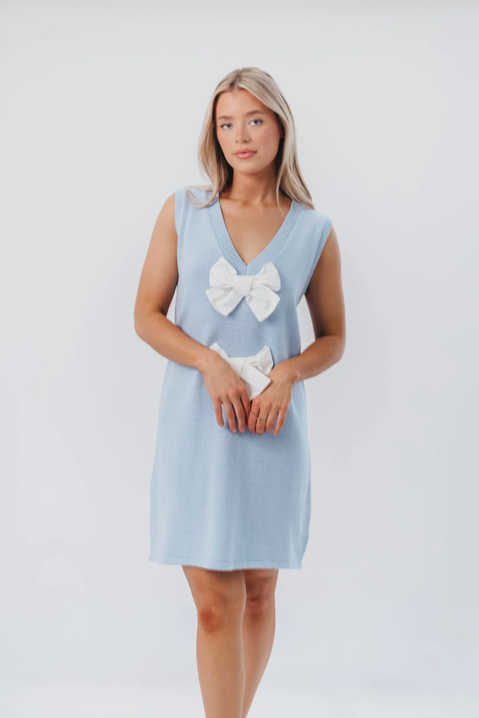 Wendy Sleeveless Sweater Mini Dress with Front Bow Detail in Sky/White sold by Worth Collective product image thumbnail 4