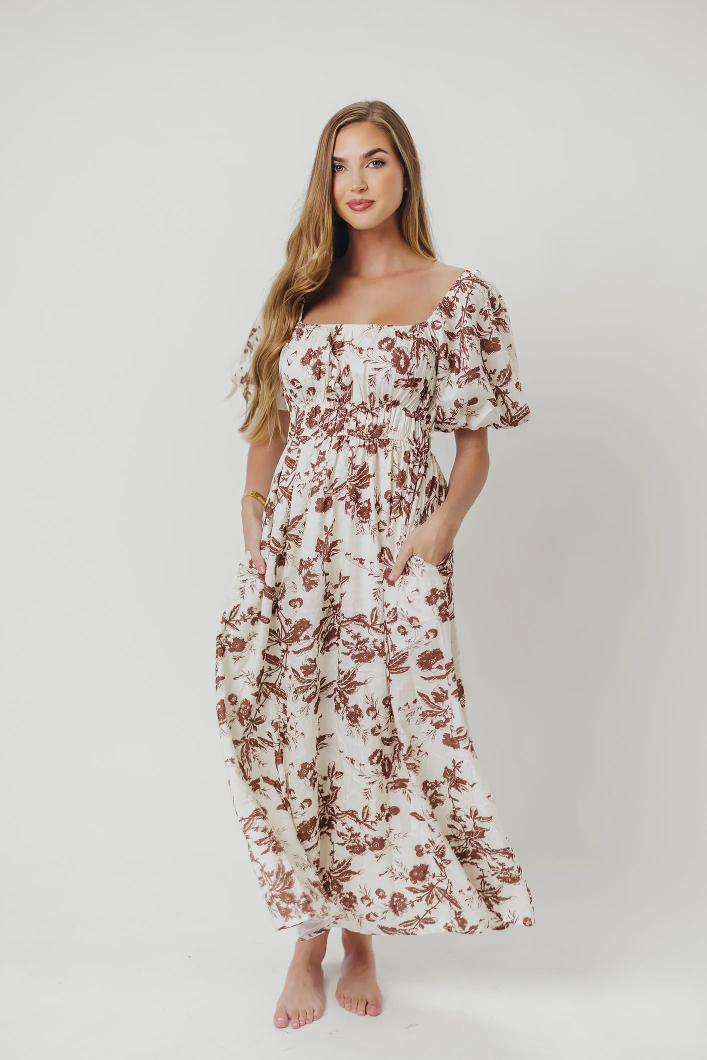 Mallory Textured Print Midi Dress in Mocha Floral sold by Worth Collective