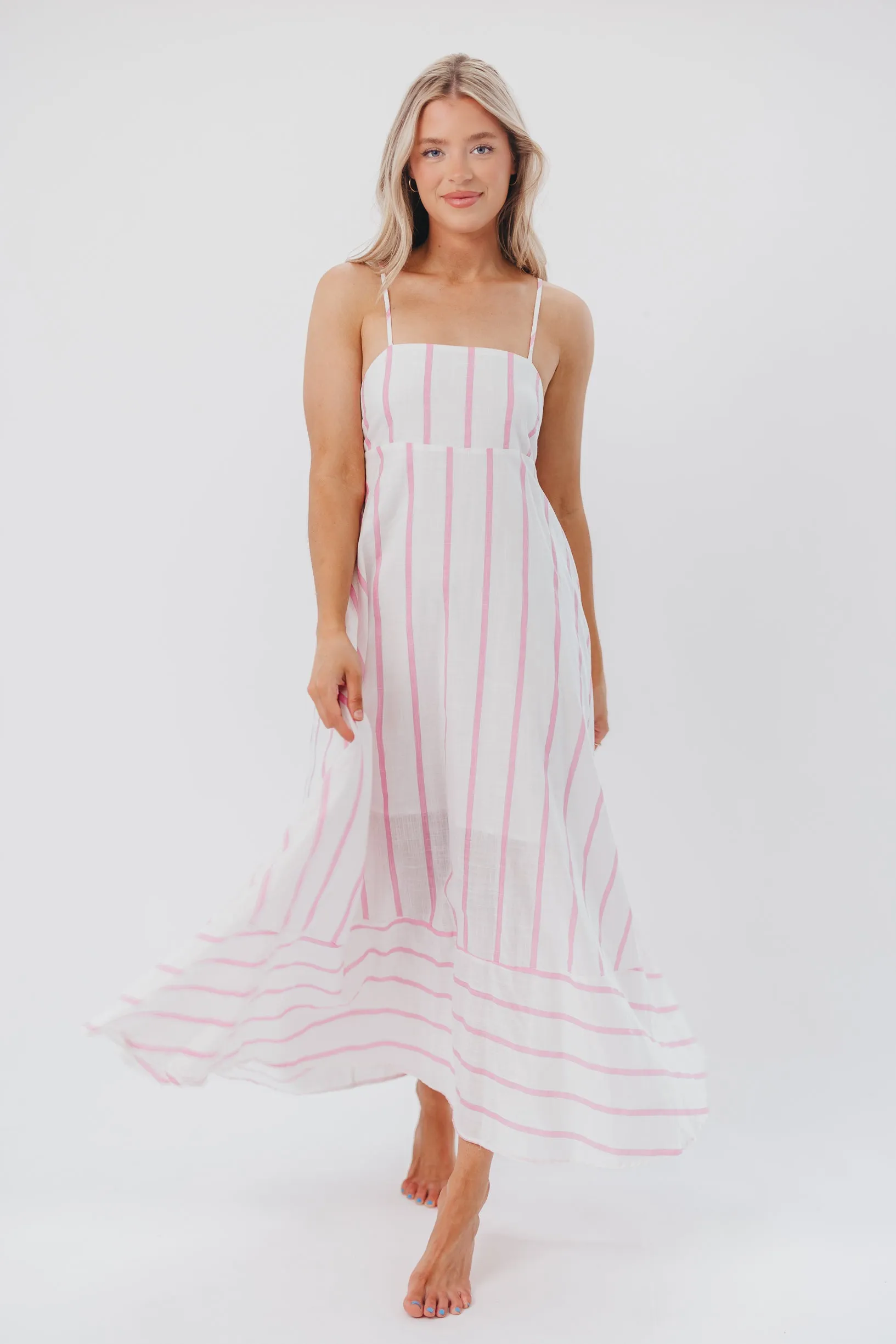Poppy Striped Maxi Dress in Pink Stripes sold by Worth Collective