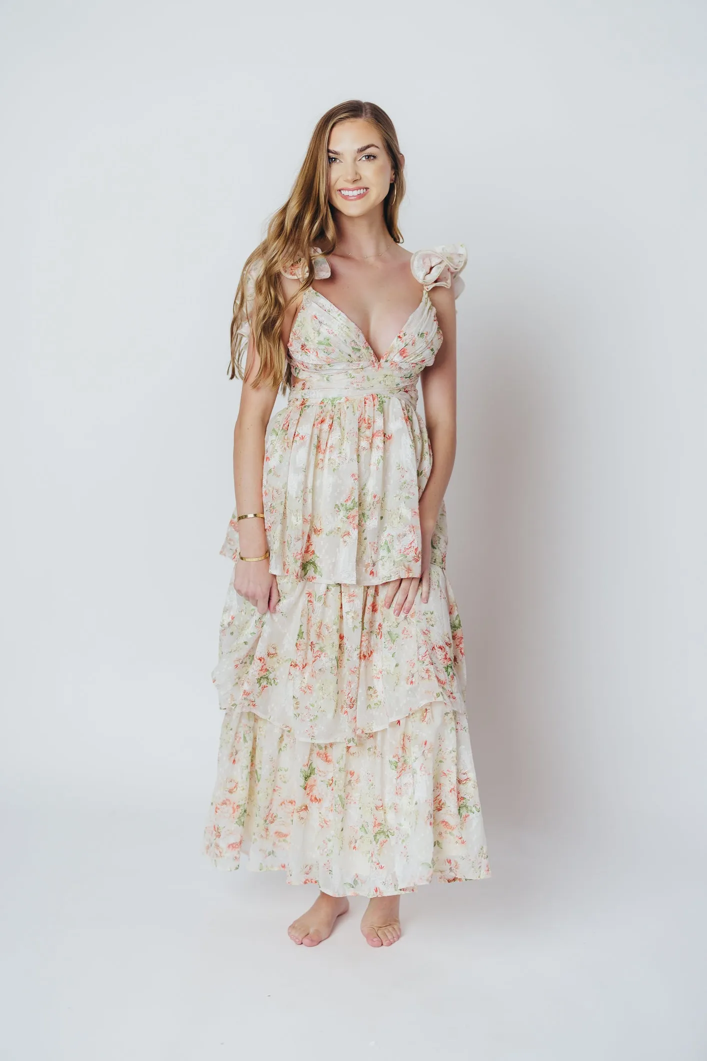 Ingrid Tiered Maxi Dress in Cream Multi Floral sold by Worth Collective