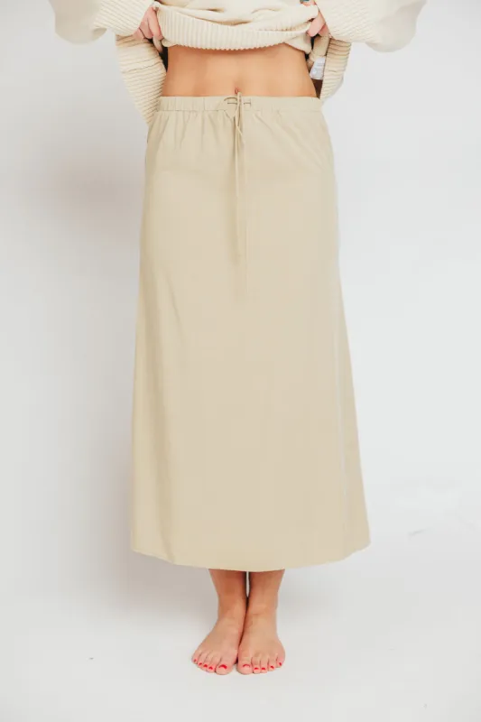 The Talia Maxi Skirt in Khaki sold by Worth Collective