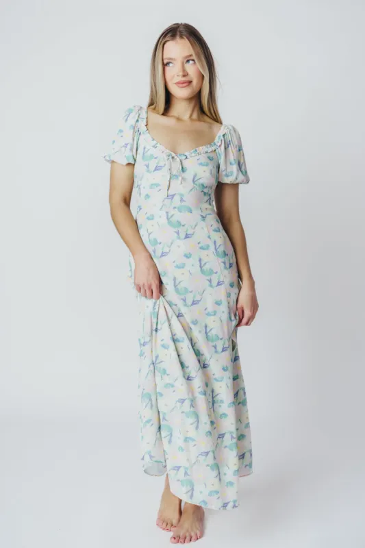 ASTR Madeline Puffed Sleeve Midi Dress in Purple/Mint Floral (XS-XL) sold by Worth Collective