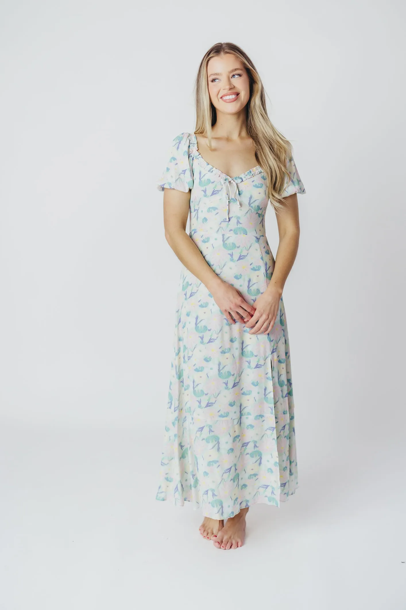 ASTR Madeline Puffed Sleeve Midi Dress in Purple/Mint Floral (XS-XL) sold by Worth Collective product image thumbnail 3