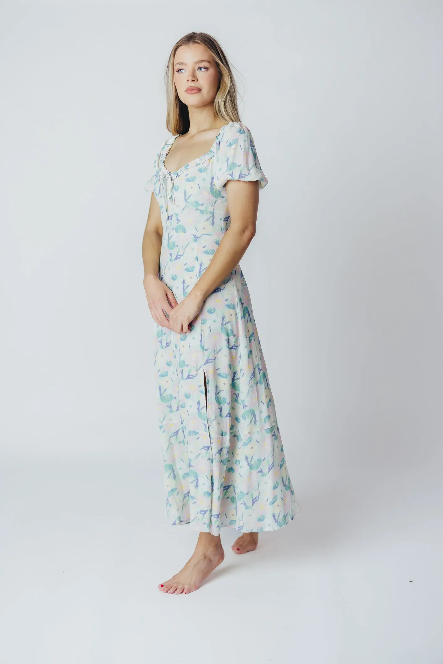 ASTR Madeline Puffed Sleeve Midi Dress in Purple/Mint Floral (XS-XL) sold by Worth Collective product image thumbnail 2