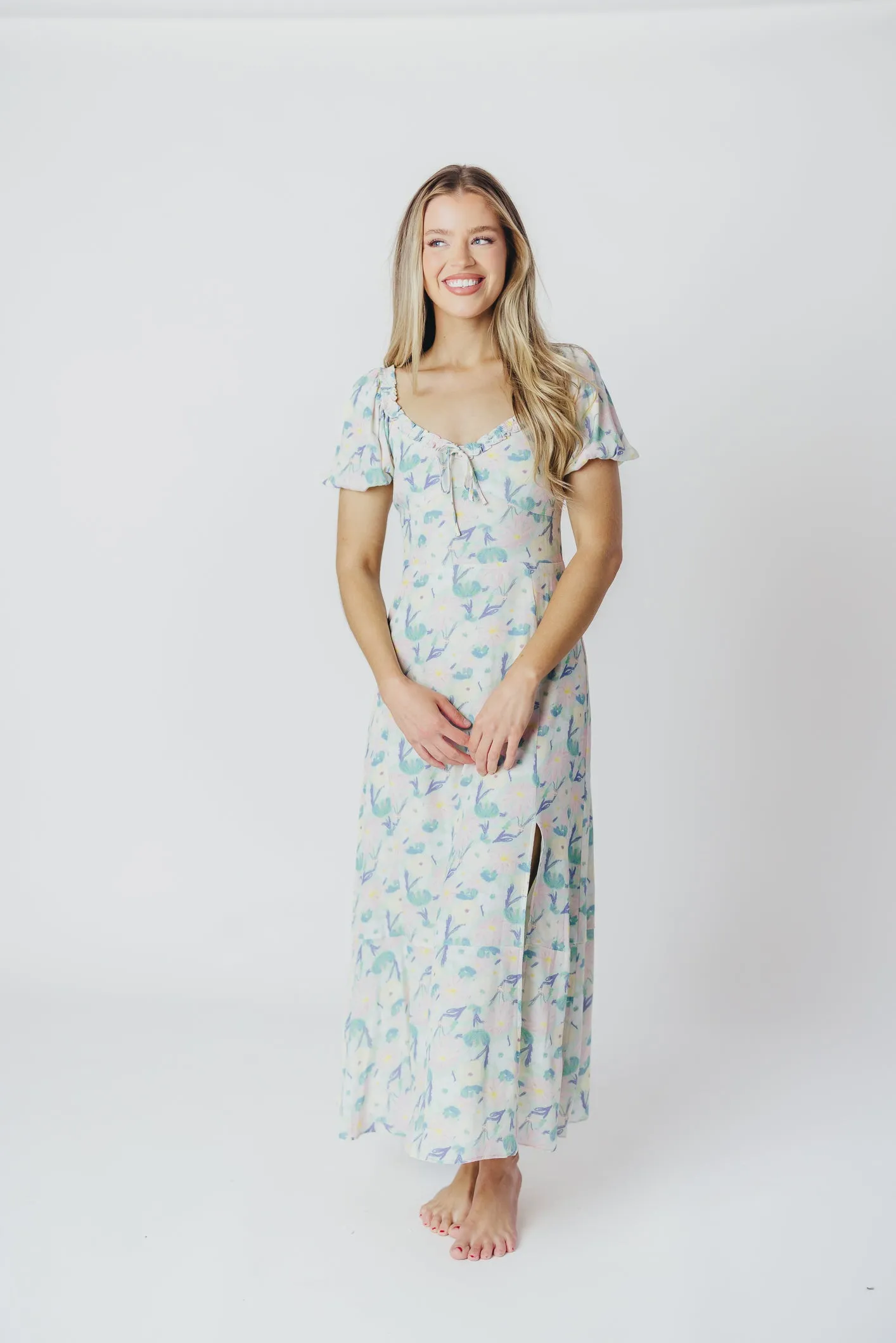 ASTR Madeline Puffed Sleeve Midi Dress in Purple/Mint Floral (XS-XL) sold by Worth Collective product image thumbnail 4