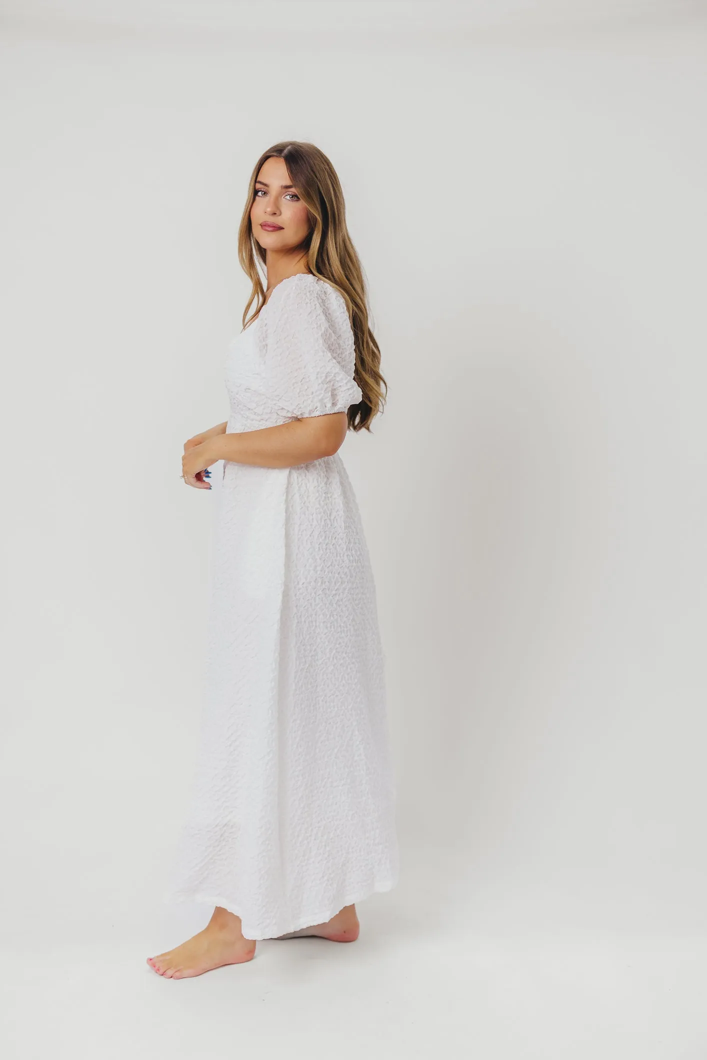 Grace Textured Weave Long Midi Dress with Puffed Sleeves in Ivory sold by Worth Collective product image thumbnail 5