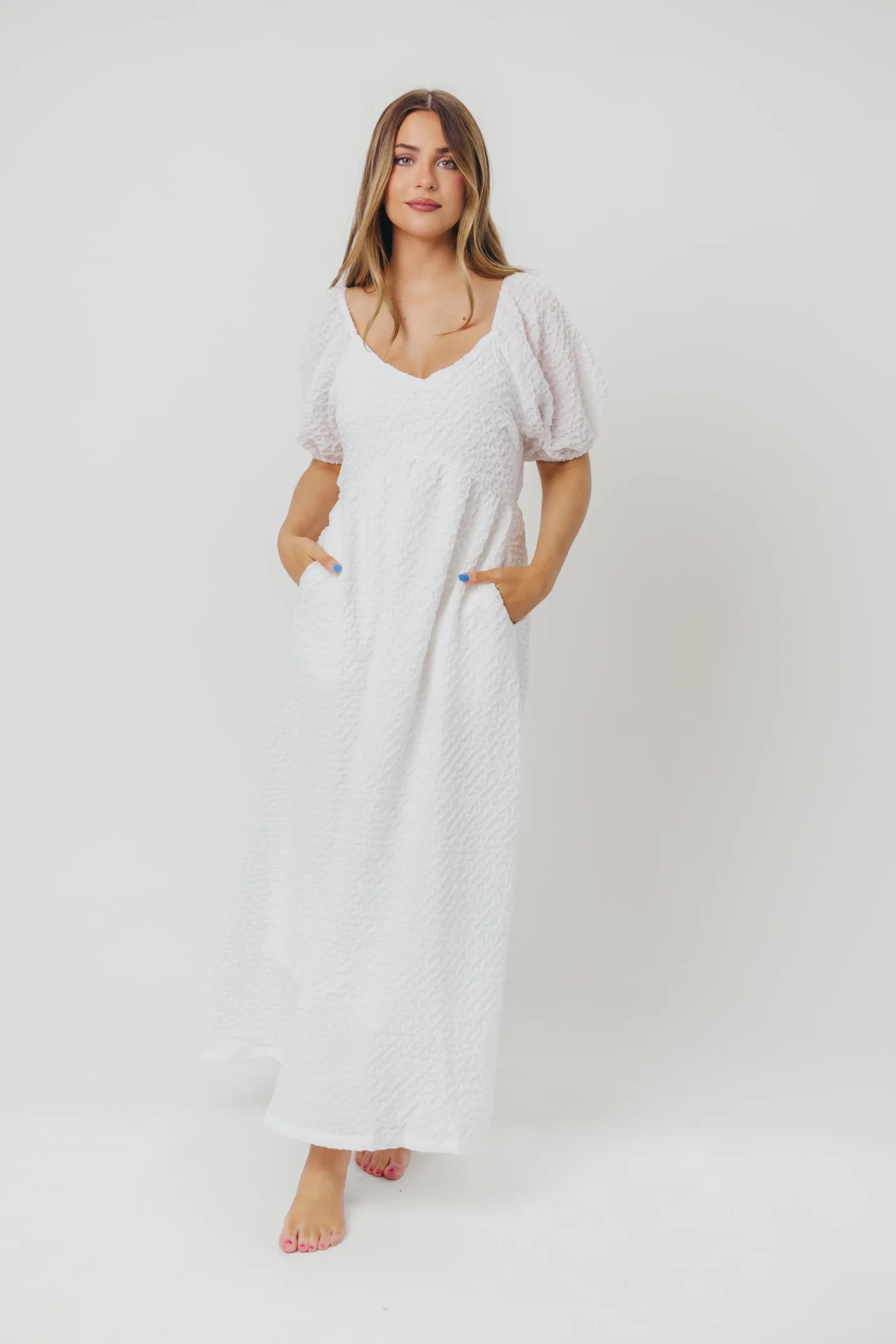 Grace Textured Weave Long Midi Dress with Puffed Sleeves in Ivory sold by Worth Collective