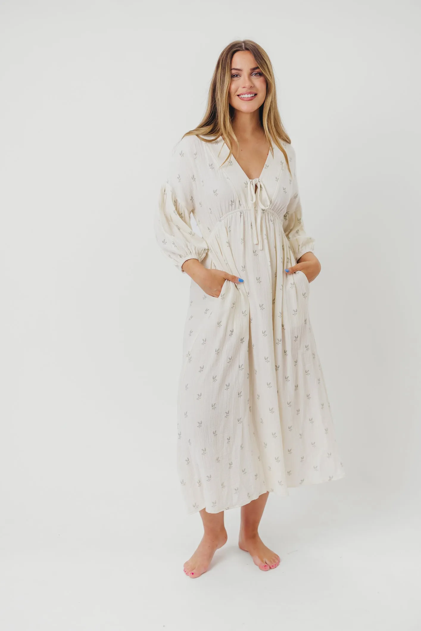 Hunter 100% Cotton Midi Dress in Soy/Sage Foliage sold by Worth Collective